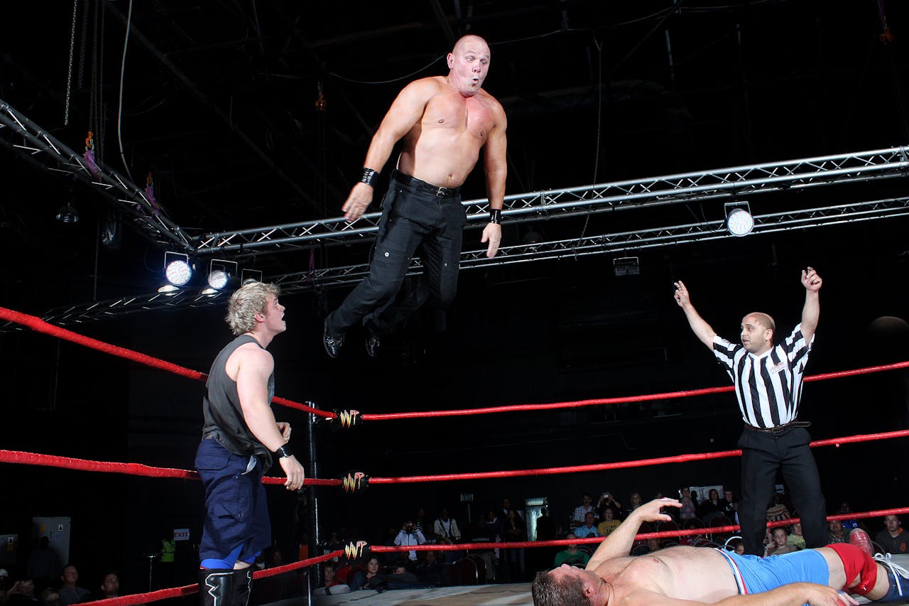 Mastering the First Impression: Your intriguing post title goes here Exciting wrestling match captures athleticism and drama in the ring.